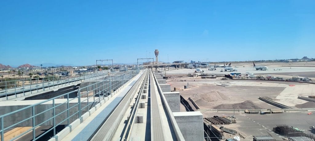 A view of a construction site from a train.