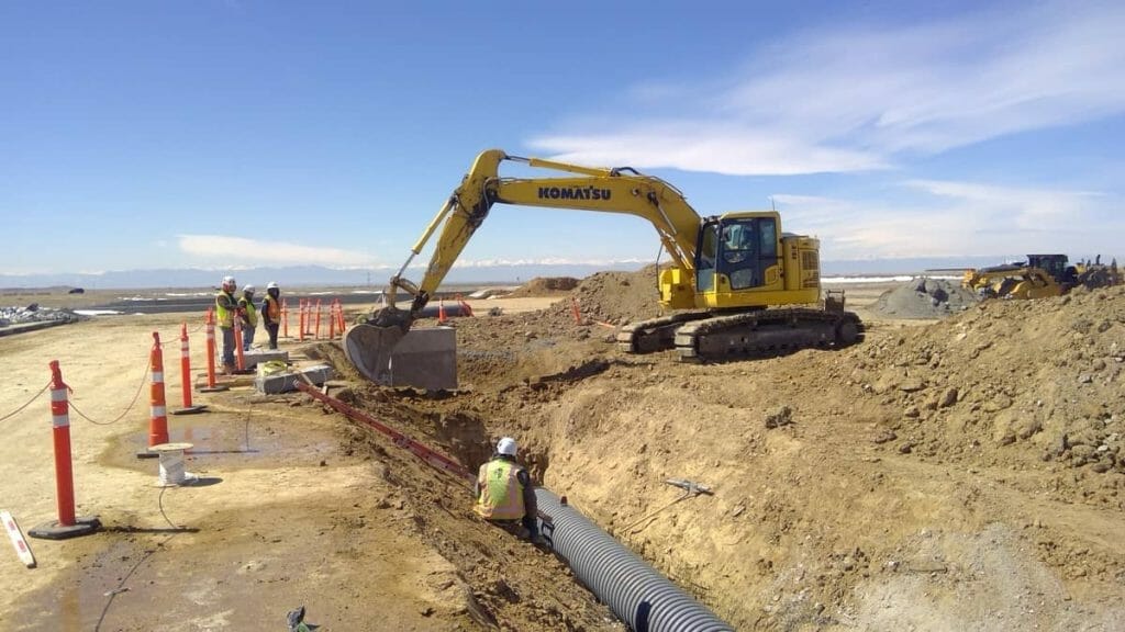 An excavator is working on a construction site.