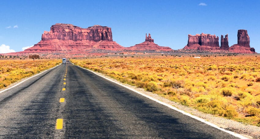 A desert road in monument valley, Arizona showcasing innovative civil engineering projects.